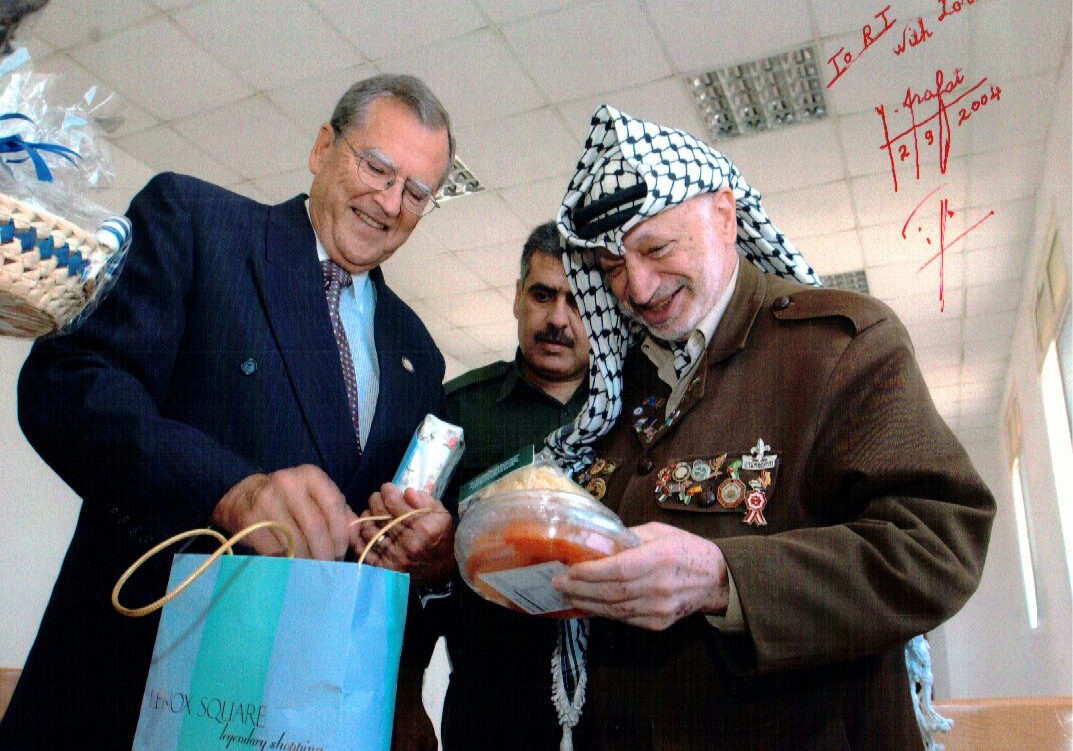 The signed photo Arafat autographed during our final visit — capturing a personal exchange that meant a great deal to us both.